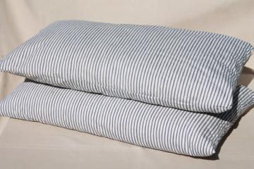 catalog photo of primitive old feather pillows, vintage blue stripe cotton ticking fabric