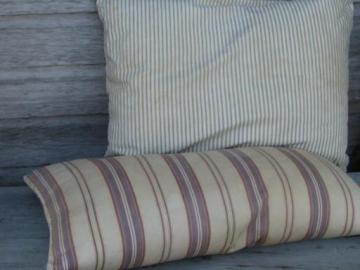 catalog photo of primitive old feather pillows, vintage striped cotton ticking fabric