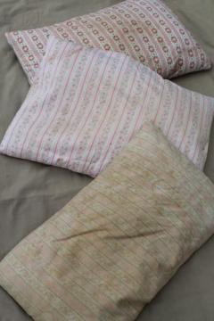 catalog photo of primitive old feather pillows with shabby vintage floral cotton ticking fabric