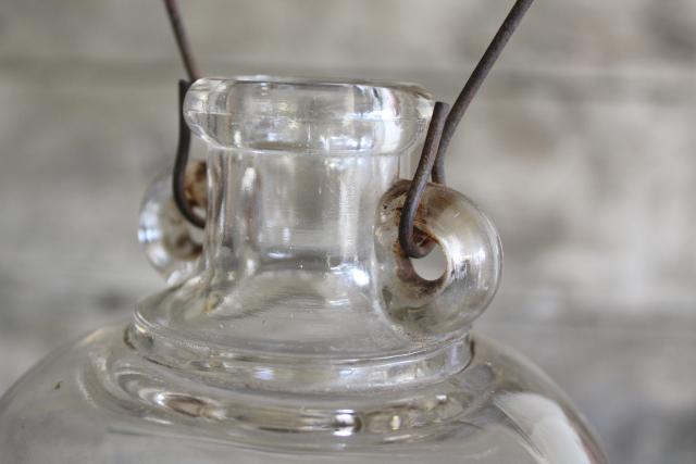 photo of primitive old glass half & gallon bottles, moonshine jug jars w/ wire bail wood handles #5