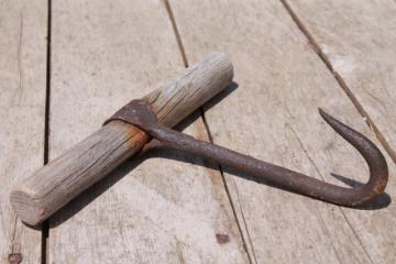 catalog photo of primitive old hand forged iron hook, bale hook or butcher's meat hook, early 1900s antique