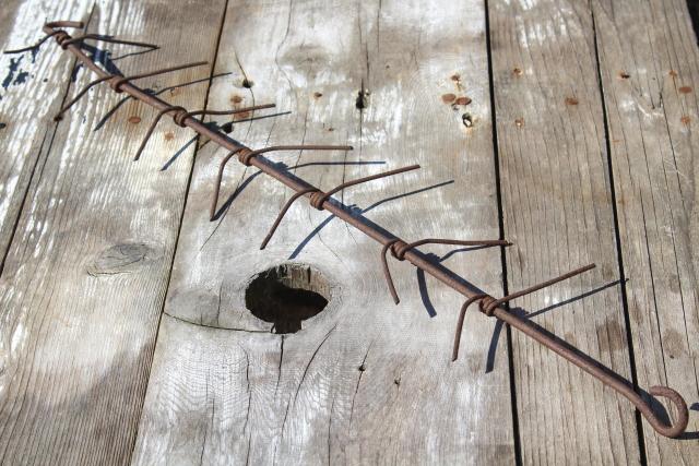 photo of primitive old iron ear corn dryer, rusty vintage wire hanging rack for popcorn, indian corn #4