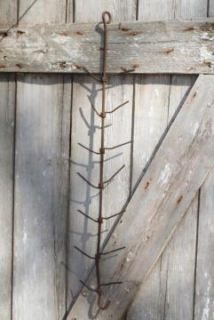 catalog photo of primitive old iron ear corn dryer, rusty vintage wire hanging rack for popcorn, indian corn