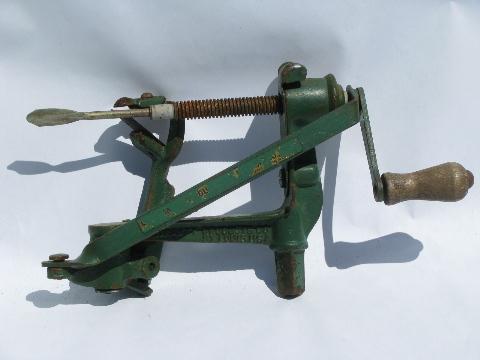 photo of primitive old kitchen tool, antique hand-crank iron Nu-Way potato peeler #1