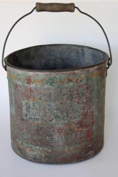 catalog photo of primitive old painted metal bucket, wood handle pail w/ worn vintage advertising