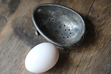 catalog photo of primitive old tin egg poacher, antique vintage kitchen gadget or soap dish