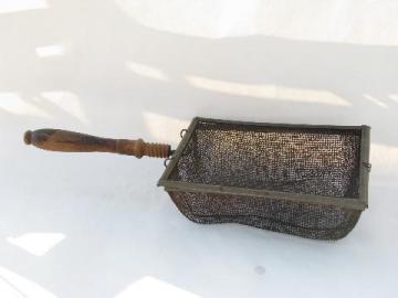 catalog photo of primitive old vintage popcorn popper, wood handle & wire basket
