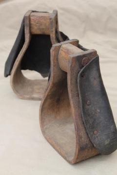 catalog photo of primitive old wood stirrups for cow pony saddle, vintage rustic western decor, cowboy horse tack