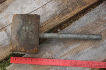 primitive rough worn old wood mallet with metal pipe handle, vintage farm tool 