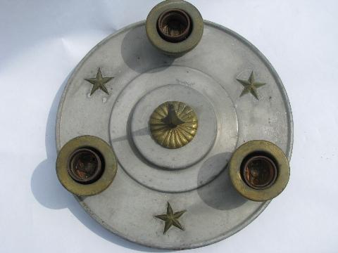 photo of primitive vintage electric light, old brass stars on galvanized metal #2