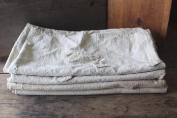 catalog photo of primitive vintage grain sacks w/ patching and mending, seamless type heavy cotton feed bags