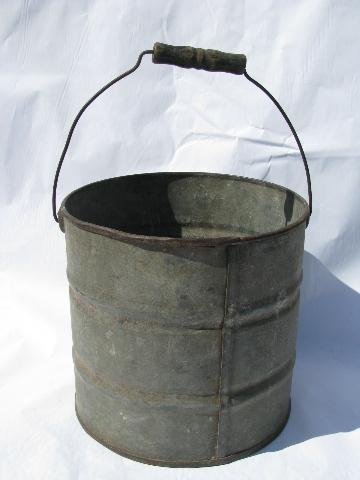 photo of primitive vintage metal farm bucket, heavy wire / old wood handle #1