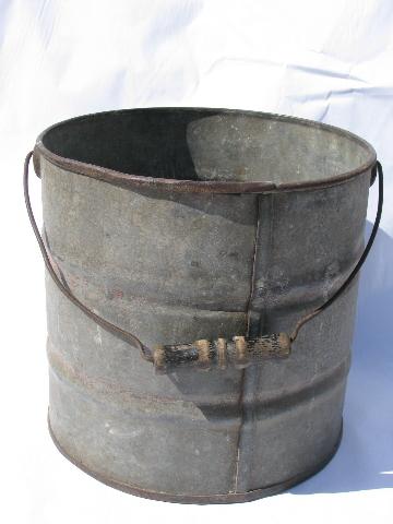 photo of primitive vintage metal farm bucket, heavy wire / old wood handle #2