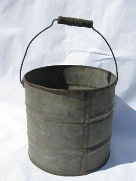 catalog photo of primitive vintage metal farm bucket, heavy wire / old wood handle