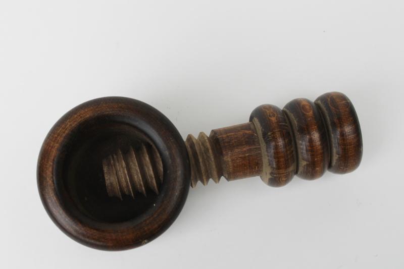 photo of primitive vintage wood nutcracker, carved wood screw type nut cracker #1