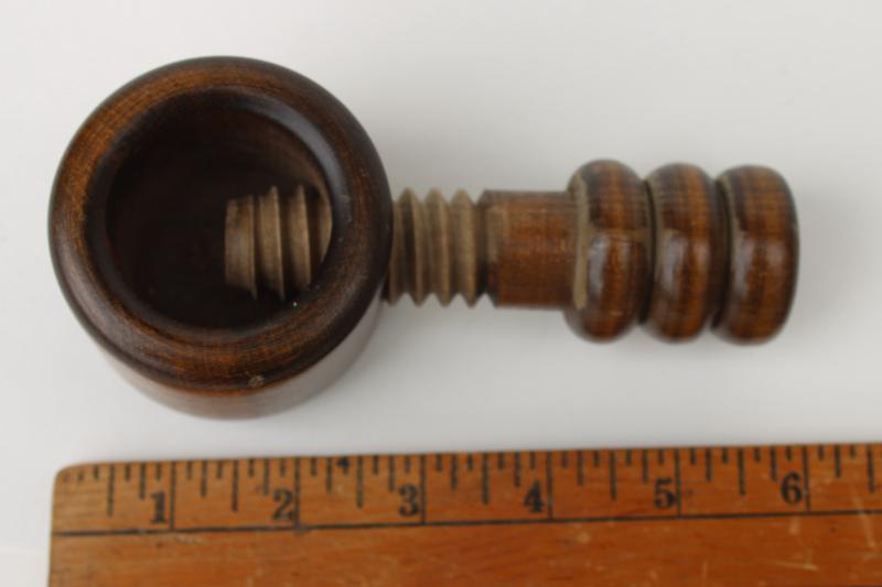 photo of primitive vintage wood nutcracker, carved wood screw type nut cracker #7