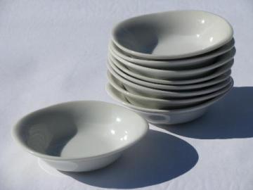 catalog photo of pure white china, porcelain sauce dishes or dipping bowls