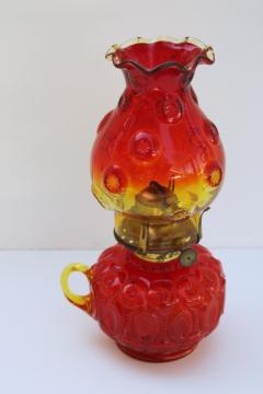 catalog photo of rare Moon & Stars pattern glass oil lamp w/ chimney shade, vintage LE Smith glass amberina color 