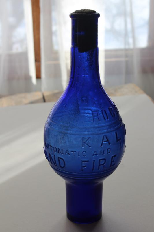 photo of rare antique glass fire extinguisher bottle grenade shape cobalt blue Rockford Kalamazoo #6