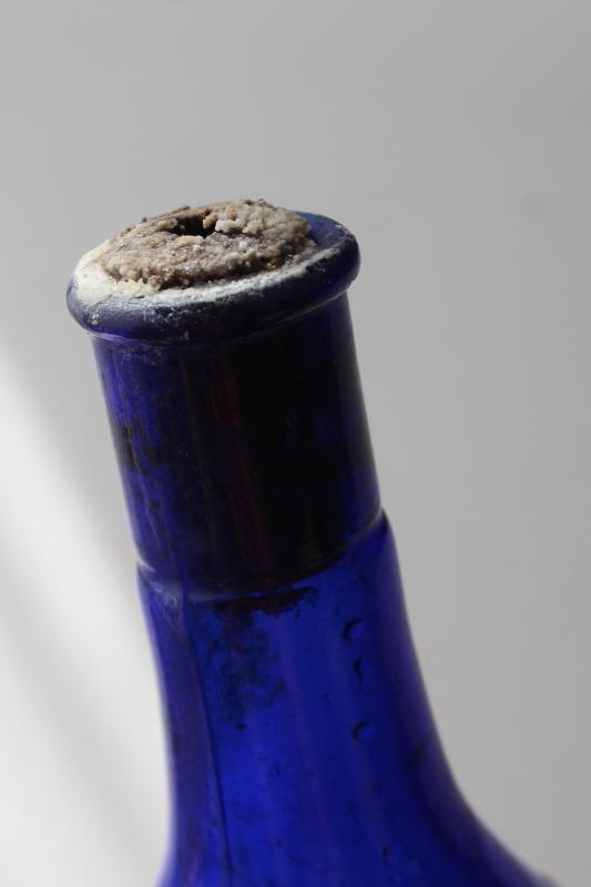 photo of rare antique glass fire extinguisher bottle grenade shape cobalt blue Rockford Kalamazoo #7