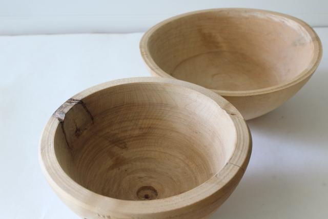 photo of raw rough natural carved wood bowls, unfinished wooden vessels with rustic flaws #2