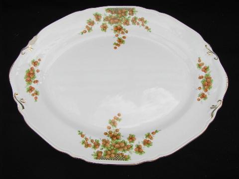 photo of red strawberries, vintage Crown Potteries strawberry china, lot of platters #2