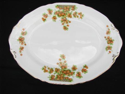 photo of red strawberries, vintage Crown Potteries strawberry china, lot of platters #3