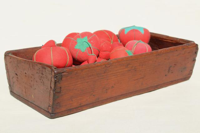 photo of red tomato pincushions, vintage pin cushion collection in primitive wood box bowl #7