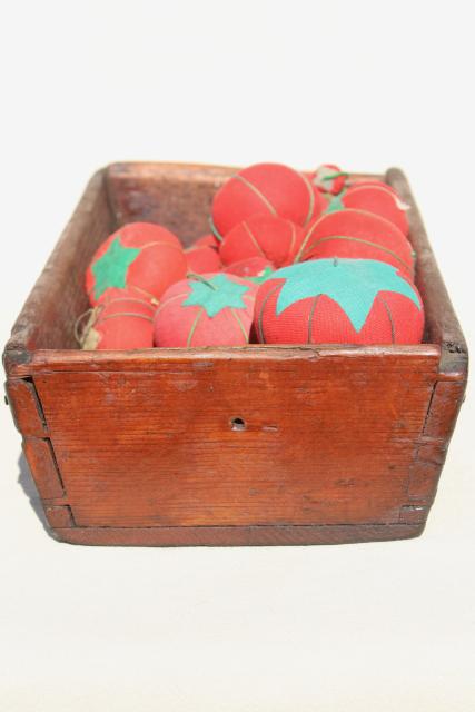 photo of red tomato pincushions, vintage pin cushion collection in primitive wood box bowl #8