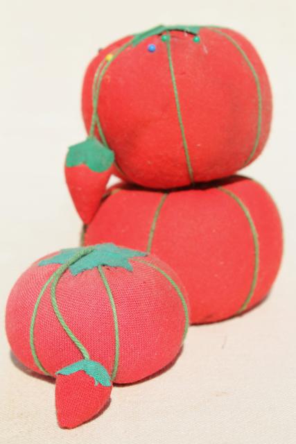 photo of red tomato pincushions, vintage pin cushion collection in primitive wood box bowl #14