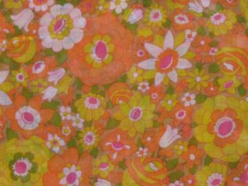 catalog photo of retro 60s vintage fabric, crisp sheer cotton w/ bright flowers print