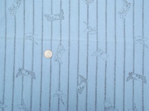 photo of retro cowboy western theme fabric, light chambray blue w/ fine pencil drawn print #1