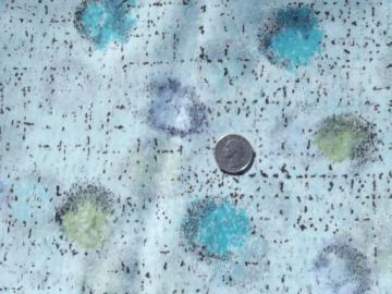 catalog photo of retro poly fabric, silky semi-sheer material, mod 60s ink spatter print