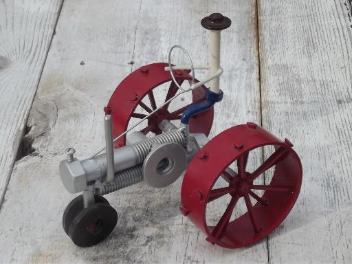 photo of retro steampunk garden art, farm tractor all made from metal hardware #1