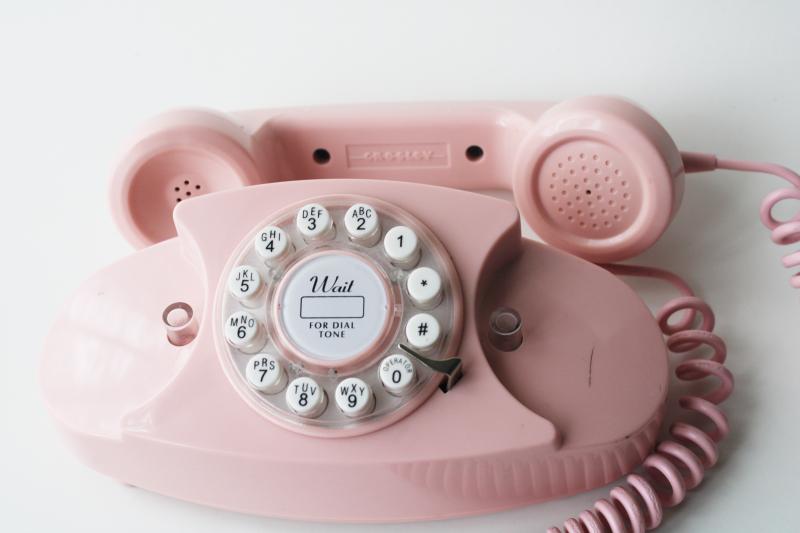 photo of retro style pink princess phone, touch tone 2015 Crosley remake of vintage telephone #2