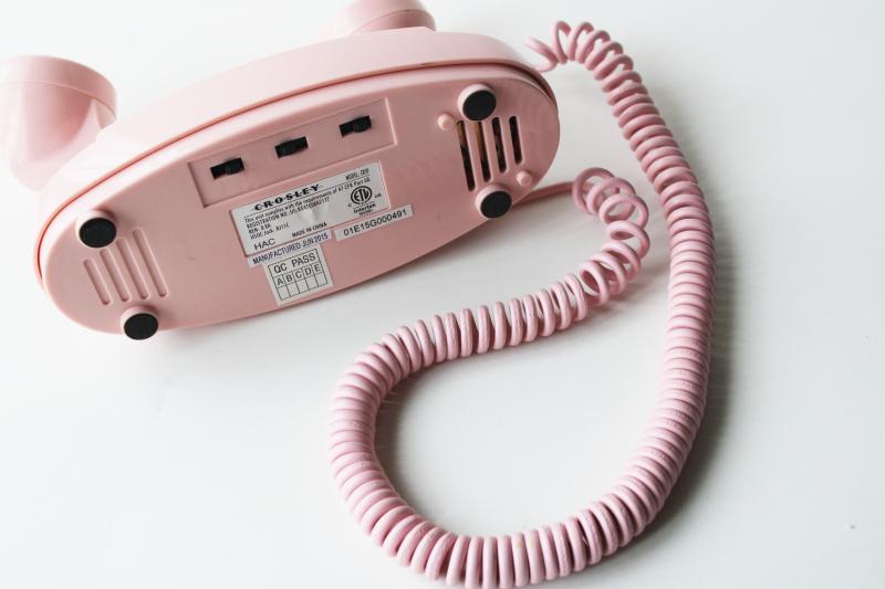 photo of retro style pink princess phone, touch tone 2015 Crosley remake of vintage telephone #5