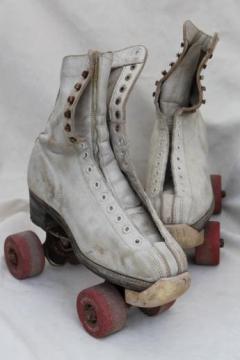 catalog photo of retro vintage roller skates w/ leather boots, very rough, great garden flower planters!