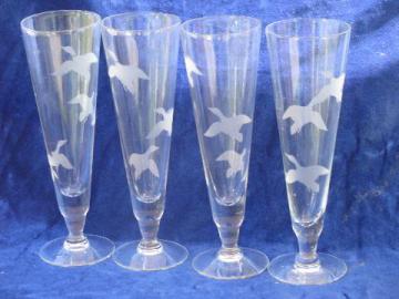 catalog photo of retro vintage tall pilsner beer glasses, etched or grey cut flying ducks