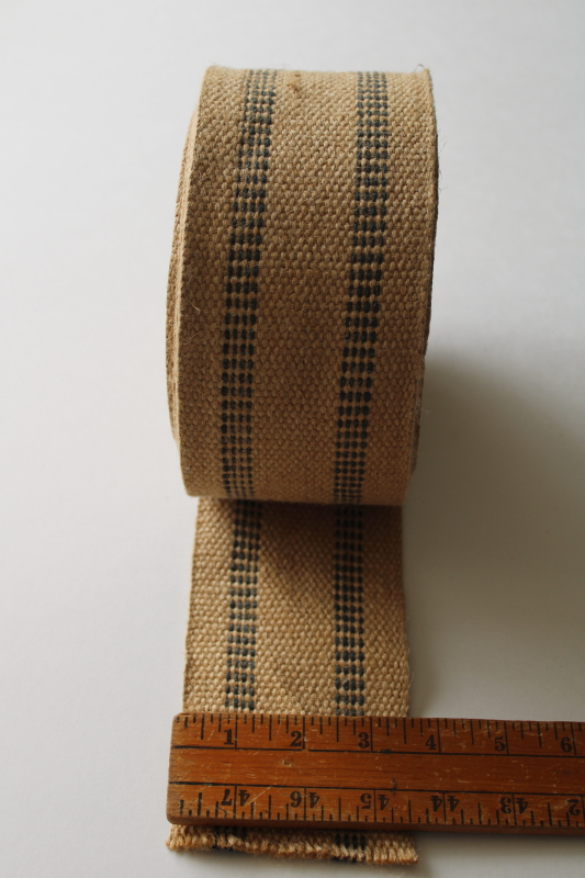 photo of roll of jute webbing, burlap texture natural brown w/ black striping  #3