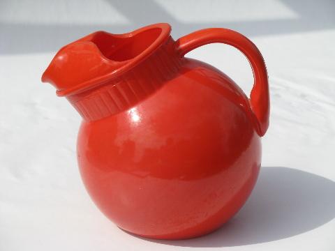 photo of round ball kitchen glass pitcher, fiesta orange Anchor Hocking rainbow glass #1