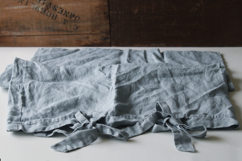 photo of rumpled washed linen pillowcase w/ ties, pure linen fabric soft chambray blue color #1