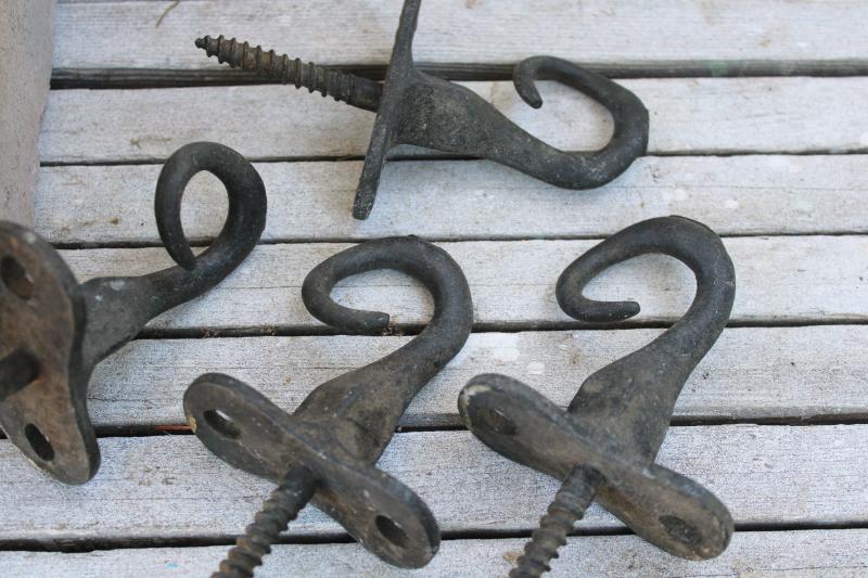 photo of rustic antique iron hooks, curved pigtail shape primitive barn pulley rope hanger #8