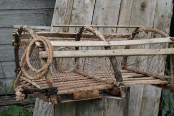 catalog photo of rustic antique wood cage turtle trap or fish trap, like a small lobster trap