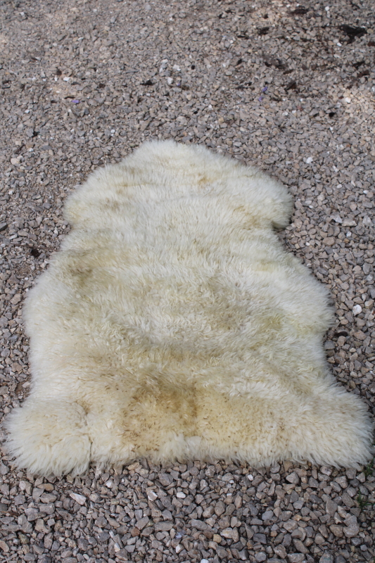 photo of rustic boho decor sheepskin hide soft fur rug or mat, fluffy natural wool #1