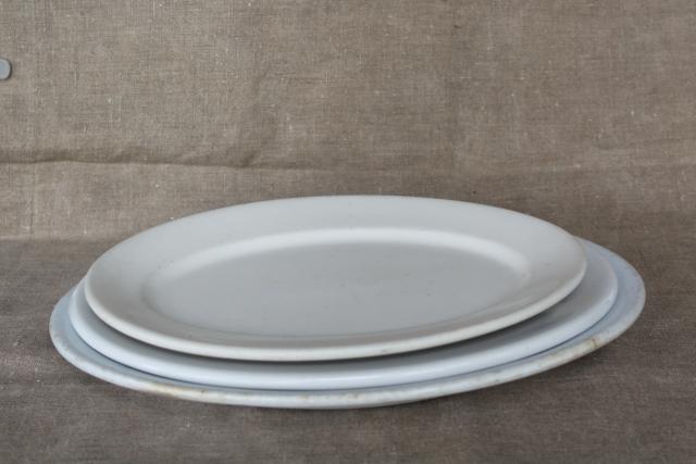 photo of rustic farmhouse kitchen old white ironstone china platters, graduated sizes stack #1