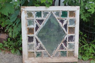 catalog photo of rustic farmhouse vintage stained glass window chippy wood colored glass