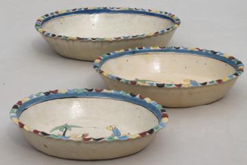 catalog photo of rustic handcrafted Mexican pottery, set of hand painted terracotta bowls