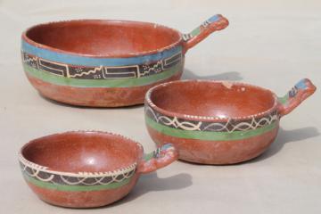 catalog photo of rustic handcrafted Mexican pottery, set of hand painted terracotta bowls