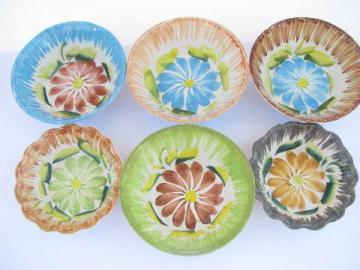 catalog photo of rustic hand-painted pottery bowls w/ big flowers, vintage Italy? old Mexico?