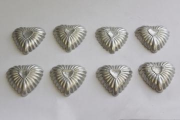 catalog photo of rustic heart shaped vintage tart pans, fluted aluminum baking tins or food molds